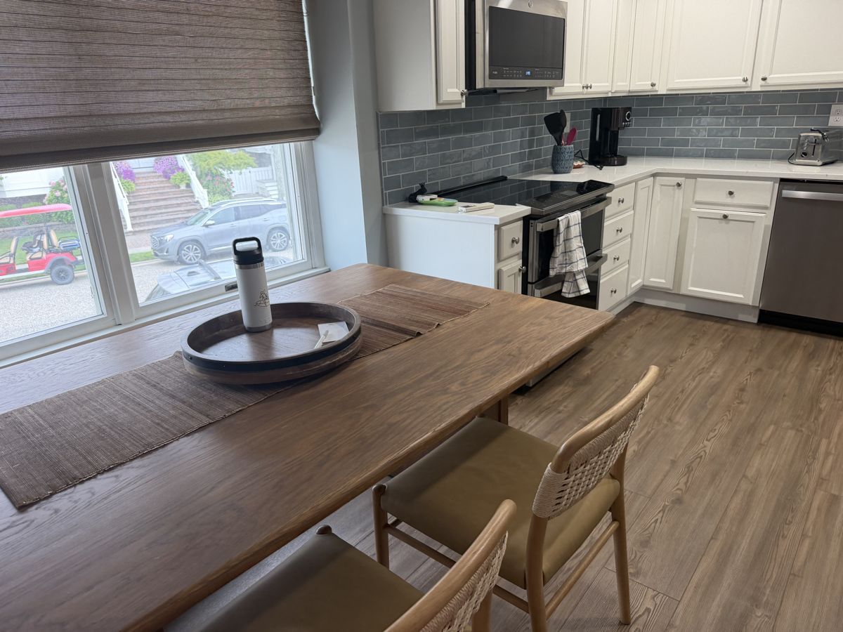 Dining table styled and kitchen reset after turnover