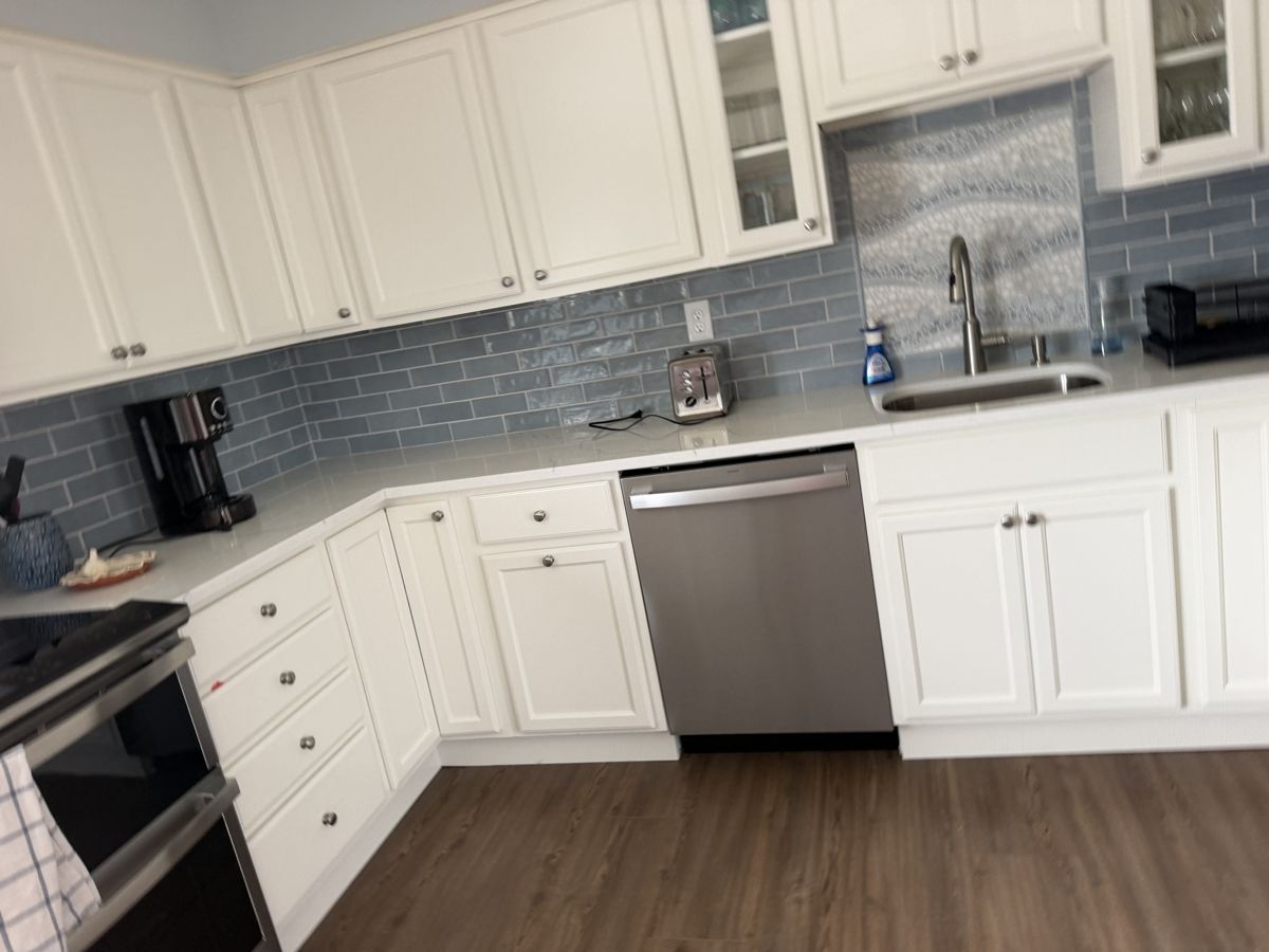 Kitchen wiped down with appliances polished