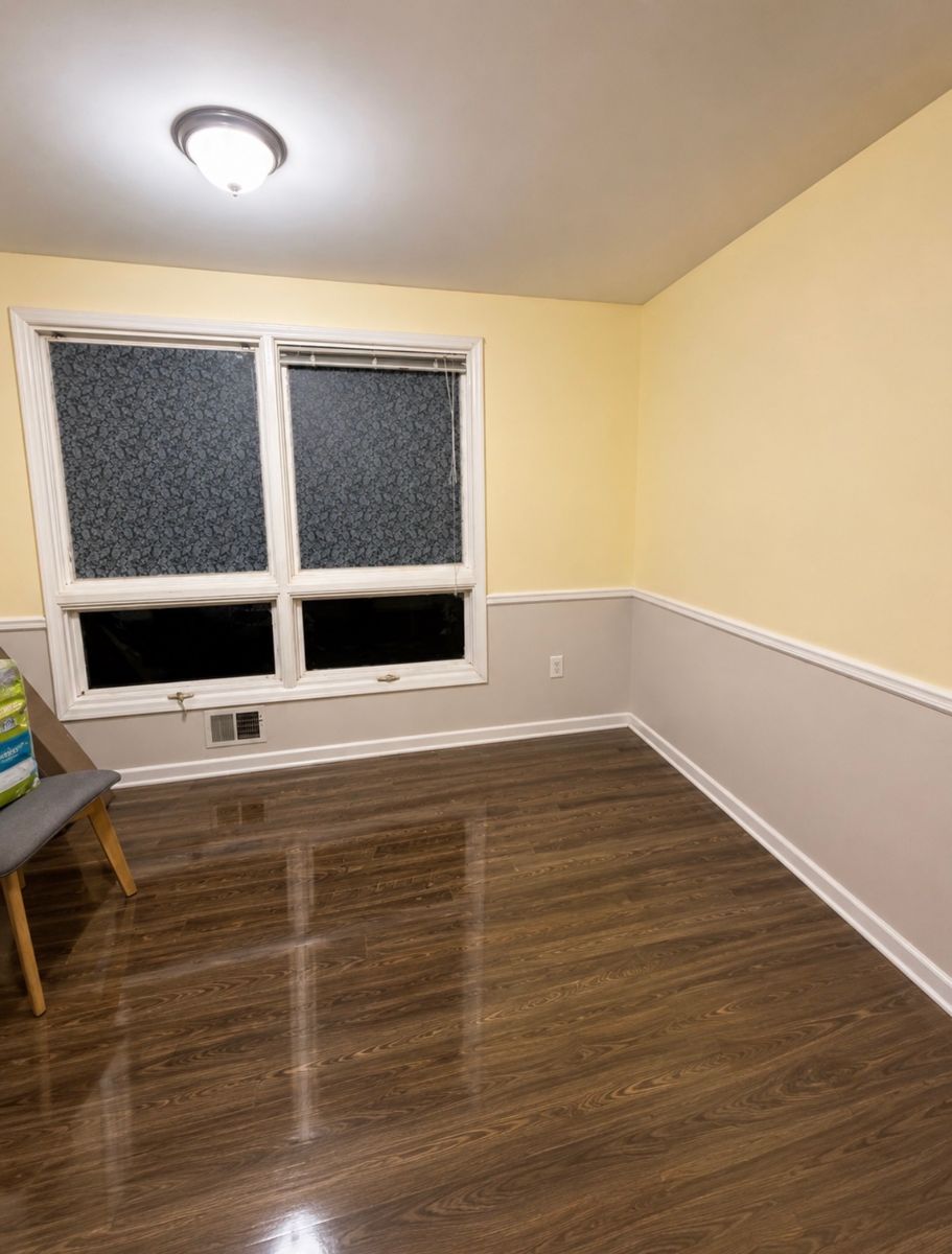 Same bedroom cleared and cleaned with a glossy floor after the move-out deep clean