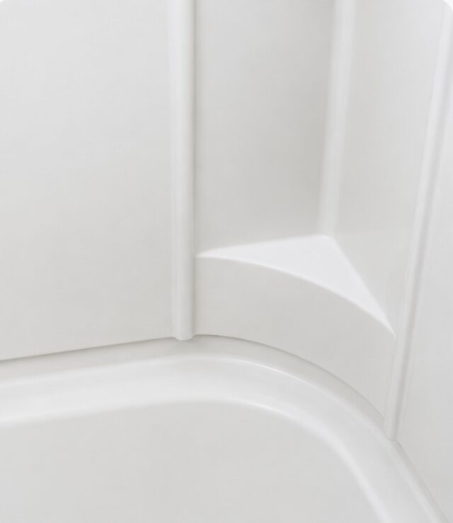 Shower surround restored to bright white after cleaning
