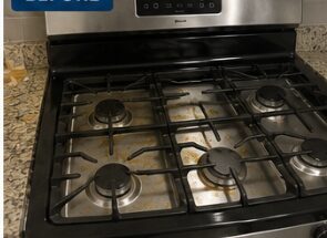 Stovetop with residue before cleaning