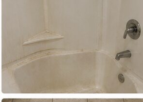 Tub with mildew and grime before cleaning